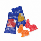 Swiss-Made Gelée-Osterhasen in bedruckten blauen Beuteln mit Logo der Ärztekasse